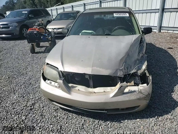 2002 Mazda Protege DX with VIN JM1BJ225X21610009, listed as a Copart auction lot 44505265 with 0 mi miles and Salvage Title. Bid and sale history available at carsss.com. Image 10.