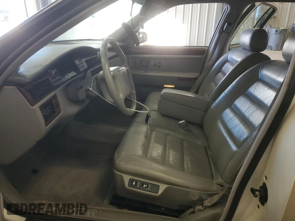 1994 Cadillac DeVille z VIN 1G6KD52B7RU290139, wystawiony jako Copart lot #46899465 z przebiegiem 133 110 mil mil oraz Czysty tytuł • Clean title. Historia ofert i sprzedaży dostępna na DreamBid. Obrazek 7.
