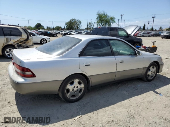 2000 Lexus ES 300 with VIN JT8BF28G9Y5100812, listed as a Copart auction lot 56790365 with 161,518 mi miles and Salvage title. Bid and sale history available at DreamBid. Image 3.