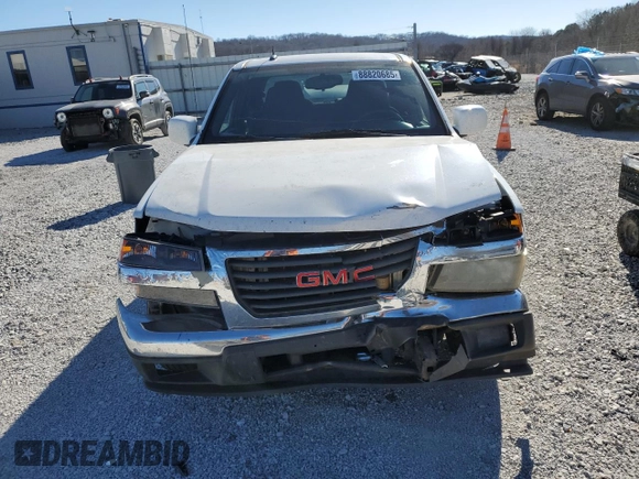 2010 GMC Canyon SLE1 with VIN 1GTDSCDE7A8100943, listed as a Copart auction lot 88820685 with 321,267 mi miles and Salvage Title. Bid and sale history available at carsss.com. Image 5.