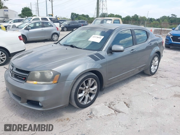 2013 Dodge Avenger R/T with VIN 1C3CDZBG4DN590183, listed as a IAAI auction lot 42178040 with 150,265 mi miles. Bid and sale history available at carsss.com. Image 2.