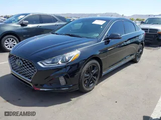 2019 Hyundai Sonata Sport with VIN 5NPE34AF2KH792374, listed as a IAAI auction lot 41987740 with 77,209 mi miles. Bid and sale history available at carsss.com. Image 2.