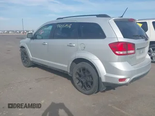 2013 Dodge Journey SXT with VIN 3C4PDDBG9DT680798, listed as a IAAI auction lot 41655958 with 140,594 mi miles and . Bid and sale history available at DreamBid. Image 3.