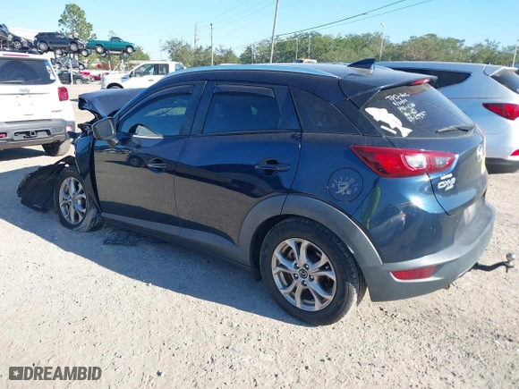 2017 Mazda CX-3 Sport with VIN JM1DKFB73H0159678, listed as a IAAI auction lot 40953743 with 99,696 mi miles. Bid and sale history available at carsss.com. Image 3.