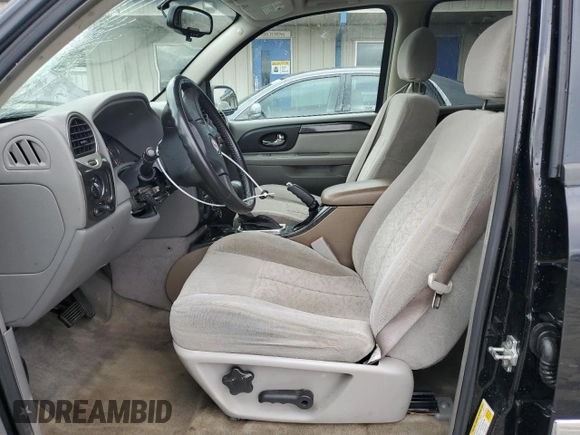 2006 GMC Envoy SLT with VIN 1GKDS13S762258032, listed as a Copart auction lot 88677095 with 184,188 mi miles and Salvage Title. Bid and sale history available at carsss.com. Image 7.