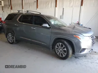 2018 Chevrolet Traverse Premier z VIN 1GNEVJKW9JJ261483, wystawiony jako Copart lot #50180235 z przebiegiem 97 537 mil mil oraz Szkoda całkowita • Salvage title. Historia ofert i sprzedaży dostępna na DreamBid. Obrazek 4.