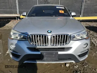 2017 BMW X4 xDrive28i with VIN 5UXXW3C52H0T77719, listed as a Copart auction lot 52393155 with 184,664 mi miles and Salvage title. Bid and sale history available at DreamBid. Image 5.