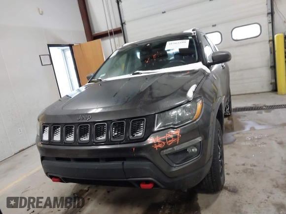 2019 Jeep Compass Trailhawk with VIN 3C4NJDDB2KT649889, listed as a IAAI auction lot 41562599 with 70,700 mi miles and . Bid and sale history available at carsss.com. Image 12.