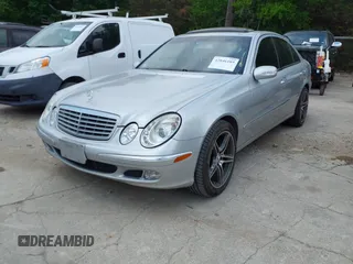 2003 Mercedes-Benz E-Class 3.2L with VIN WDBUF65J23A200332, listed as a IAAI auction lot 42046189 with 269,668 mi miles. Bid and sale history available at carsss.com. Image 2.
