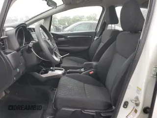 2015 Honda Fit LX with VIN 3HGGK5H57FM722000, listed as a Copart auction lot 57331455 with 140,546 mi miles and Salvage title. Bid and sale history available at DreamBid. Image 7.