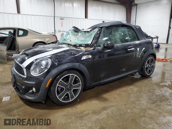 2013 MINI Convertible S with VIN WMWZP3C51DT297891, listed as a Copart auction lot 56745065 with 101,292 mi miles and Salvage title. Bid and sale history available at DreamBid. Image 1.