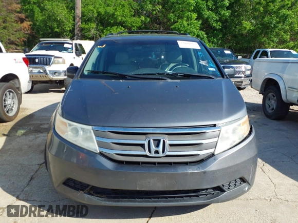 2011 Honda Odyssey EX-L with VIN 5FNRL5H6XBB073482, listed as a IAAI auction lot 42090463 with 213,061 mi miles and . Bid and sale history available at carsss.com. Image 12.