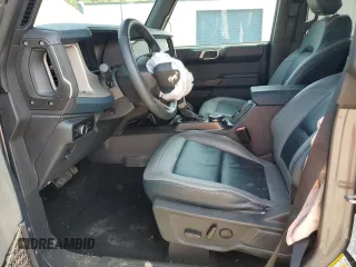 2024 Ford Bronco Outer Banks с VIN 1FMEE8BP1RLA57668, выставлен на аукционе Copart как лот 49614705 с пробегом 20 969 миль миль и Списание • Salvage title. История ставок и продаж доступна на DreamBid. Изображение 7.
