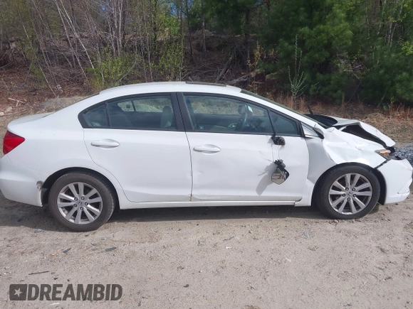 2012 Honda Civic EX with VIN 2HGFB2F81CH607670, listed as a IAAI auction lot 42128341 with 104,090 mi miles and . Bid and sale history available at DreamBid. Image 13.