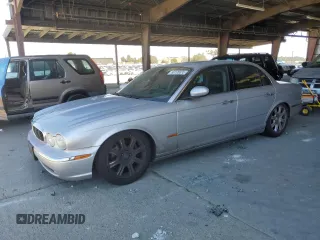 2004 Jaguar XJ 8 with VIN SAJWA71C54SG31186, listed as a Copart auction lot 66195835 with 67,442 mi miles and Clean title. Bid and sale history available at DreamBid. Image 1.