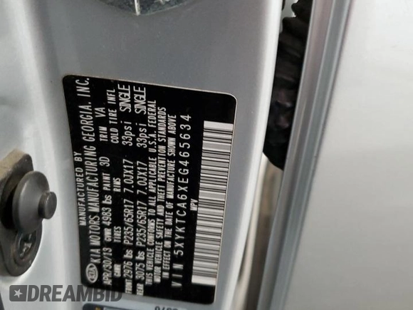 2014 Kia Sorento LX z VIN 5XYKTCA6XEG465634, wystawiony jako Copart lot #57148995 z przebiegiem 201 503 mil mil oraz Szkoda całkowita • Salvage title. Historia ofert i sprzedaży dostępna na DreamBid. Obrazek 14.