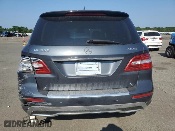 2015 Mercedes-Benz M 350 with VIN 4JGDA5HB2FA555743, listed as a Copart auction lot 65165695 with 147,152 mi miles and Salvage title. Bid and sale history available at DreamBid. Image 6.