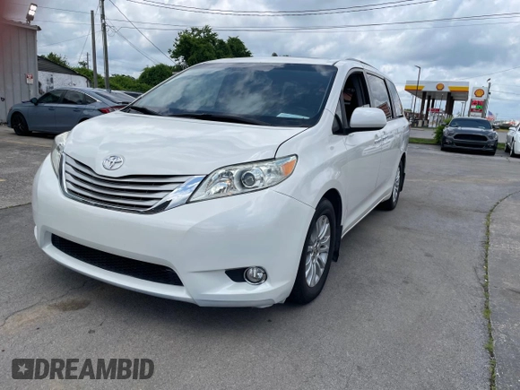 2016 Toyota Sienna XLE with VIN 5TDYK3DC3GS761177, listed as a Copart auction lot 61506935 with 134,732 mi miles and Clean title. Bid and sale history available at DreamBid. Image 2.