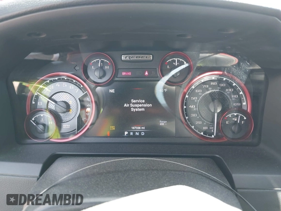 2015 Ram 1500 Rebel z VIN 1C6RR7YT0FS751334, wystawiony jako IAAI lot #41933040 z przebiegiem 167 336 mil mil oraz . Historia ofert i sprzedaży dostępna na DreamBid. Obrazek 7.