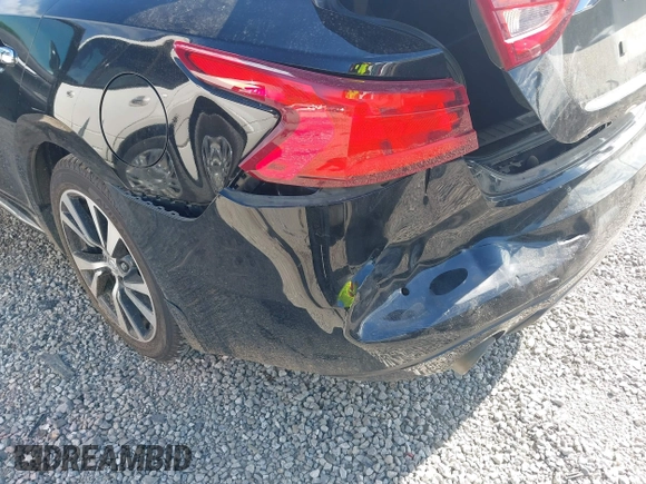 2016 Nissan Maxima SR z VIN 1N4AA6AP2GC426089, wystawiony jako IAAI lot #42314306 z przebiegiem 67 439 mil mil oraz . Historia ofert i sprzedaży dostępna na DreamBid. Obrazek 6.