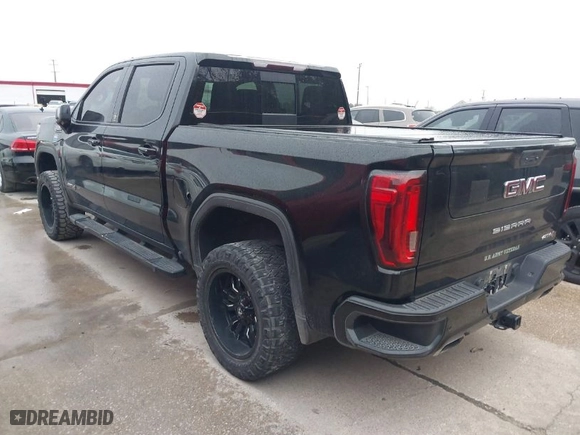 2019 GMC Sierra 1500 AT4 with VIN 1GTP9EEDXKZ144019, listed as a IAAI auction lot 41598034 with 106,046 mi miles. Bid and sale history available at carsss.com. Image 3.