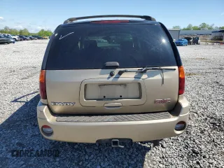 2004 GMC Envoy SLT с VIN 1GKDS13S942270065, выставлен на аукционе Copart как лот 52803515 с пробегом 242 026 миль миль и Списание • Salvage title. История ставок и продаж доступна на DreamBid. Изображение 6.