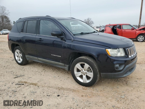 2011 Jeep Compass with VIN 1J4NT1FB9BD208248, listed as a Copart auction lot 48203455 with 127,934 mi miles and Salvage Title. Bid and sale history available at carsss.com. Image 4.