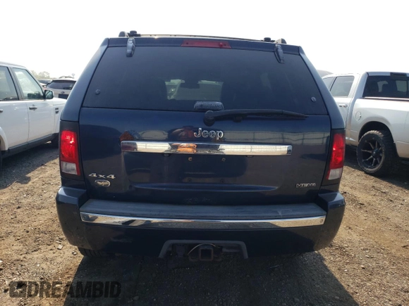 2009 Jeep Grand Cherokee with VIN 1J8HR68T19C535580, listed as a Copart auction lot 57119855 with 208,078 mi miles and Clean title. Bid and sale history available at DreamBid. Image 6.
