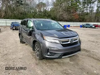 2020 Honda Pilot Touring 8-Passenger with VIN 5FNYF5H91LB004386, listed as a Copart auction lot 85913984 with 54,692 mi miles and Salvage Title. Bid and sale history available at DreamBid. Image 11.