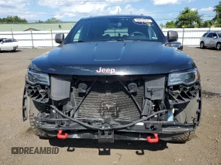 2019 Jeep Grand Cherokee Trailhawk with VIN 1C4RJFLT8KC726784, listed as a Copart auction lot 66010235 with 136,683 mi miles and Salvage title. Bid and sale history available at DreamBid. Image 5.