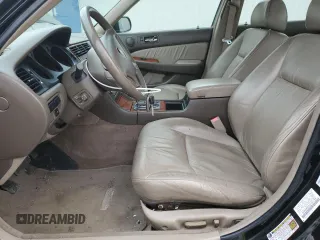 2004 Acura RL w/Navigation System z VIN JH4KA96664C007799, wystawiony jako Copart lot #44207245 z przebiegiem 215 098 mil mil oraz Szkoda całkowita • Salvage title. Historia ofert i sprzedaży dostępna na DreamBid. Obrazek 7.