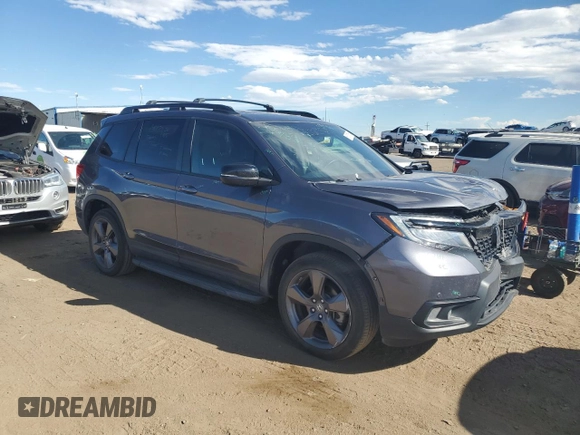 2020 Honda Passport Touring with VIN 5FNYF8H93LB011244, listed as a Copart auction lot 68113584 with 31,232 mi miles and Salvage Title. Bid and sale history available at carsss.com. Image 4.