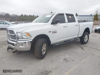 2014 Ram 2500 SLT with VIN 3C6TR5DT3EG304843, listed as a IAAI auction lot 41106277 with 71,553 mi miles. Bid and sale history available at carsss.com. Image 2.