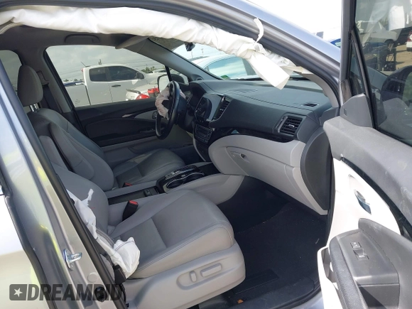 2021 Honda Pilot Touring 8-Passenger with VIN 5FNYF5H99MB041638, listed as a IAAI auction lot 42112915 with 33,230 mi miles and . Bid and sale history available at DreamBid. Image 5.