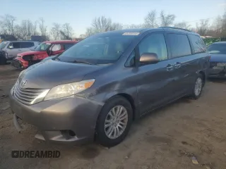 2015 Toyota Sienna XLE with VIN 5TDYK3DC2FS573393, listed as a Copart auction lot 41769415 with 329,692 mi miles and Salvage Title. Bid and sale history available at carsss.com. Image 1.