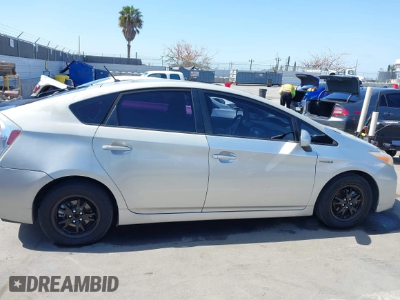 2015 Toyota Prius Four with VIN JTDKN3DU1F1986165, listed as a IAAI auction lot 42281036 with 212,838 mi miles and . Bid and sale history available at DreamBid. Image 13.