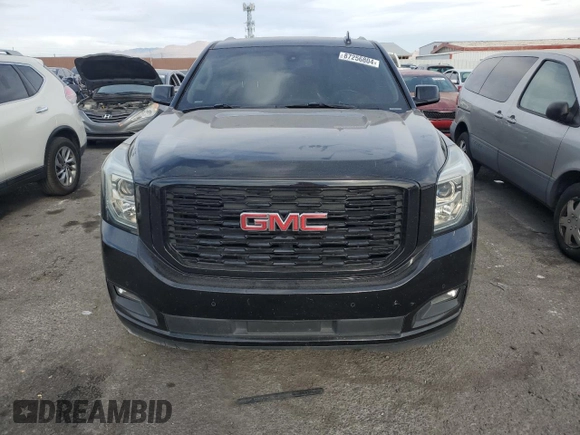 2019 GMC Yukon SLE with VIN 1GKS1AKC2KR101675, listed as a Copart auction lot 87256804 with 144,572 mi miles and Salvage Title. Bid and sale history available at carsss.com. Image 5.