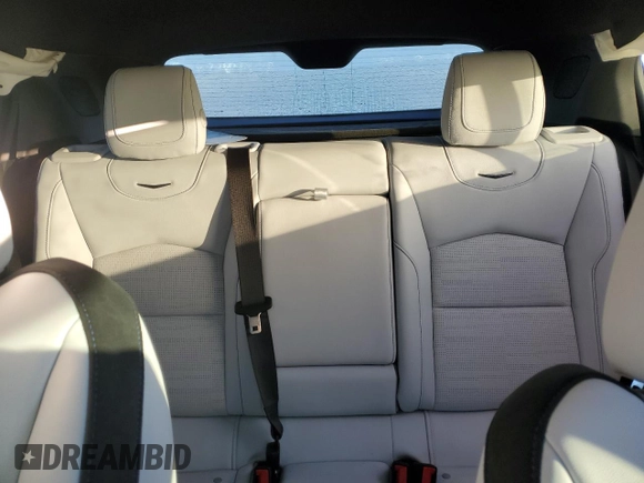 2024 Cadillac XT4 FWD Sport with VIN 1GYFZER47RF101186, listed as a Copart auction lot 79128454 with 10,499 mi miles and Salvage title. Bid and sale history available at DreamBid. Image 10.