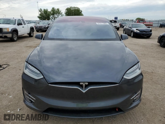 2016 Tesla Model X 70D z VIN 5YJXCAE29GF006512, wystawiony jako Copart lot #57517885 z przebiegiem Nie podano mil oraz Szkoda całkowita • Salvage title. Historia ofert i sprzedaży dostępna na DreamBid. Obrazek 5.