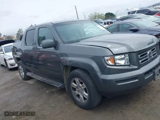 2007 Honda Ridgeline RTL w/Leather with VIN 2HJYK16537H523732, listed as a IAAI auction lot 41798931 with 219,881 mi miles. Bid and sale history available at carsss.com. Image 13.