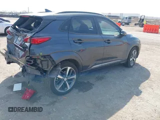 2021 Hyundai Kona Ultimate with VIN KM8K53A50MU601084, listed as a IAAI auction lot 41900099 with 56,171 mi miles. Bid and sale history available at carsss.com. Image 4.