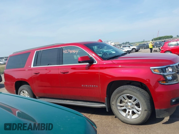 2015 Chevrolet Suburban LT with VIN 1GNSKJKC5FR726299, listed as a IAAI auction lot 42740904 with 96,700 mi miles and . Bid and sale history available at DreamBid. Image 13.