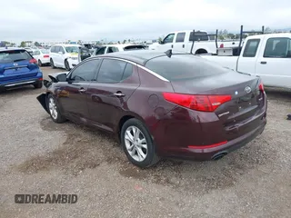 2012 Kia Optima EX with VIN 5XXGN4A76CG024213, listed as a IAAI auction lot 41871583 with 194,168 mi miles and . Bid and sale history available at carsss.com. Image 3.