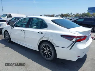 2023 Toyota Camry SE with VIN 4T1G11AK0PU736081, listed as a IAAI auction lot 42090419 with 32,303 mi miles and . Bid and sale history available at DreamBid. Image 3.