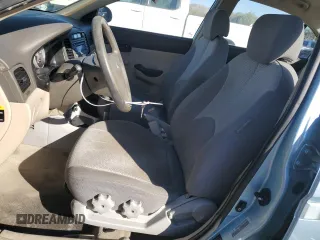 2006 Hyundai Accent GLS with VIN KMHCN46C76U053685, listed as a Copart auction lot 46544965 with 288,694 mi miles and Salvage Title. Bid and sale history available at carsss.com. Image 7.