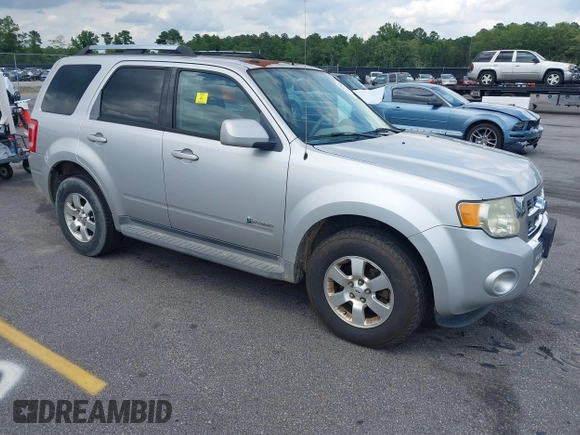 2009 Ford Escape Hybrid z VIN 1FMCU49399KB18857, wystawiony jako IAAI lot #42502324 z przebiegiem 227 828 mil mil oraz . Historia ofert i sprzedaży dostępna na DreamBid. Obrazek 1.