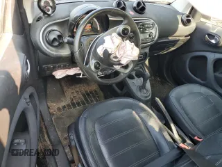 2016 Smart fortwo Passion с VIN WMEFJ5DA7GK066701, выставлен на аукционе Copart как лот 59093055 с пробегом 84 417 миль миль и Списание • Salvage title. История ставок и продаж доступна на DreamBid. Изображение 8.