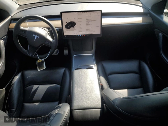2022 Tesla Model Y Performance with VIN 7SAYGDEF1NF486218, listed as a Copart auction lot 63127435 with 99,302 mi miles and Salvage title. Bid and sale history available at DreamBid. Image 8.