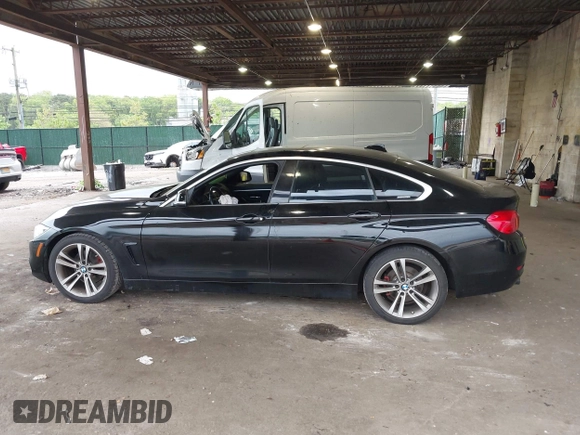 2016 BMW 4 Series 428i xDrive with VIN WBA4C9C58GG139151, listed as a IAAI auction lot 42151827 with 92,698 mi miles and . Bid and sale history available at DreamBid. Image 14.