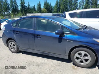 2014 Toyota Prius Four with VIN JTDKN3DU7E1742714, listed as a IAAI auction lot 42637235 with 184,734 mi miles and . Bid and sale history available at DreamBid. Image 13.